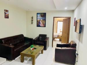 Posezení v ubytování Gulberg Luxurious Cozy 1 BHK Appt