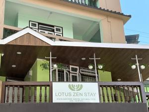 a church with a sign in front of a building at Lotus Zen Stay in Gangtok