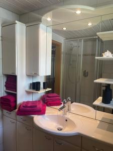 Koupelna v ubytování Rose Apartment mit Sauna und HS-Card, Belle Apartment mit HS-Card - Greschuk Apartments + 40 fotografií