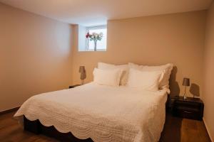 Giường trong phòng chung tại Porsgrunn City Apartments