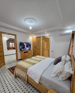 Postel nebo postele na pokoji v ubytování Riad Gogo