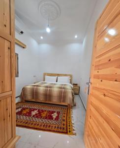 Postel nebo postele na pokoji v ubytování Riad Gogo