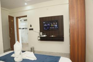 TV a/nebo společenská místnost v ubytování Hotel Rest O ITPL