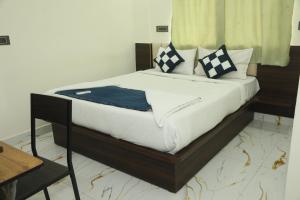 Postel nebo postele na pokoji v ubytování Hotel Rest O ITPL