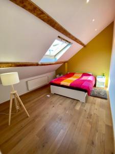 Postel nebo postele na pokoji v ubytování Stijlvolle duplex nabij Brussel en luchthaven!