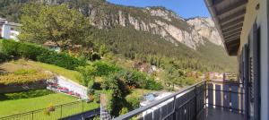 a balcony with a view of a mountain at Apartments Giovannini in Fai della Paganella