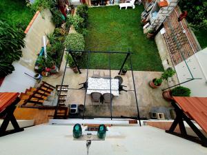 an aerial view of a patio with a swing at Villa Napoleon in Les Lilas