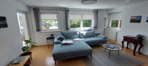 a living room with a couch and a table at Haus Statz 48 in Matrei am Brenner