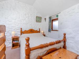 Ένα ή περισσότερα κρεβάτια σε δωμάτιο στο The Tack House