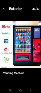 a vending machine filled with lots of soda bottles at Eaton KL,1R1B,0 Service,500mbps,KLCC,2 pax in Kuala Lumpur