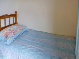 Ένα ή περισσότερα κρεβάτια σε δωμάτιο στο Weach Barton Granary