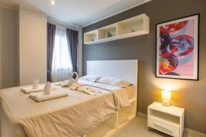 Ένα ή περισσότερα κρεβάτια σε δωμάτιο στο Modern Condo - 1BR T1-201