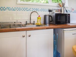 Køkken eller tekøkken på Happy Valley Chalet