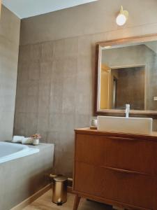 Koupelna v ubytování La Parenthèse exotique, duplex cosy à deux pas du lagon