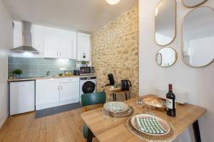 Dapur atau dapur kecil di La Grainerie Loft - Centre-Ville