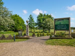 a sign at the entrance to a park at Twin Oaks in Fritton Norfolk