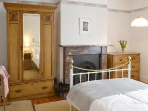 Ένα ή περισσότερα κρεβάτια σε δωμάτιο στο Drovers