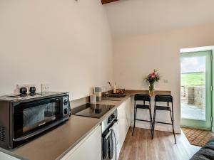Kuchyň nebo kuchyňský kout v ubytování Cart Shed - Uk41245