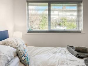 En eller flere senge i et værelse på The Sand Martin + 9 billeder