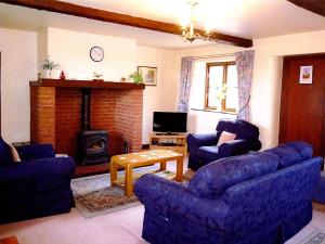 Ruang duduk di Stildon Manor Cottage +6 gambar