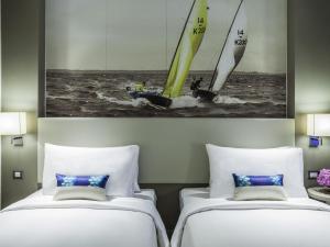 Katil atau katil-katil dalam bilik di Mercure Pattaya Ocean Resort
