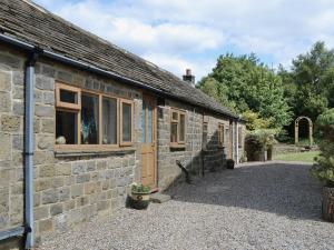 an old stone house with a window and a driveway at Fellbeck -9565 in Grantley +5 photos