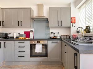 Køkken eller tekøkken på Norfolk Broads Cottage