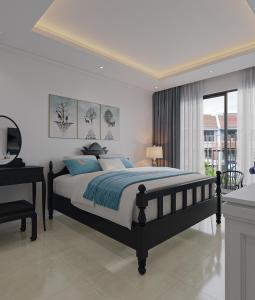 a bedroom with a large bed and a desk at Luna Oriental in Phu Quoc +55 photos