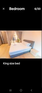 a picture of a bedroom with a king size bed at Eaton KL,1R1B,0 Service,300mbps,KLCC,2 pax in Kuala Lumpur