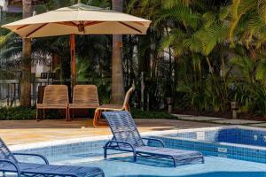 Piscina de la sau aproape de Boulevard Bombinhas - Apartamento em Condo com Piscina +33 fotografii