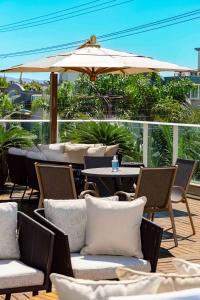 Un balcon sau o terasă la Boulevard Bombinhas - Apartamento em Condo com Piscina