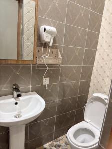 Phòng tắm tại RADIANT Smile HOTEL