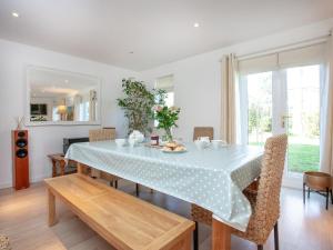 a dining room with a table and chairs at Lark Rise in Northam