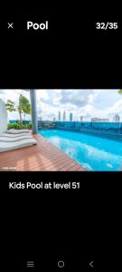 ein Bild von einem Swimmingpool mit den Worten Pool bei in der Unterkunft Eaton KL,2R1B,0 Service,KLCC,500mbps,2-4pax in Kuala Lumpur