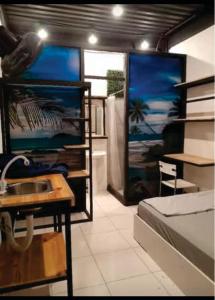 TV a/nebo společenská místnost v ubytování Costa Rica Walk in