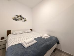 Voodi või voodid majutusasutuse Funktastic Central Maksimir Condo toas