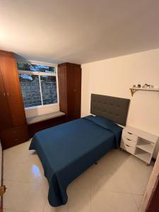 Katil atau katil-katil dalam bilik di Cozy Quite Poblado 3 bedroom