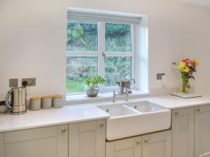 Køkken eller tekøkken på Humford Mill Cottage