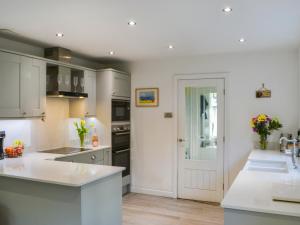 Køkken eller tekøkken på Humford Mill Cottage