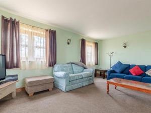 Et opholdsområde på Mimi Cottage