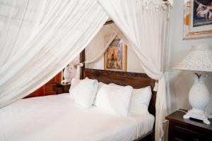 Giường trong phòng chung tại ANTIGUA RESIDENCE - 1102 - Beach Cottage +56 ảnh