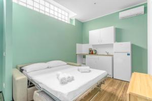 Dapur atau dapur kecil di new cozyflat free wifi e AC 7 min Rho fiera
