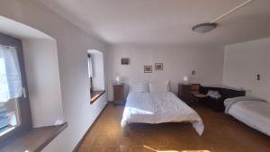 Ένα ή περισσότερα κρεβάτια σε δωμάτιο στο Breakfast with mountains view