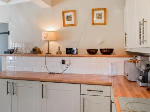 Η κουζίνα ή μικρή κουζίνα στο Rattlebeck Cottage