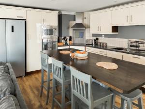 Kuchyň nebo kuchyňský kout v ubytování Nene Cottage