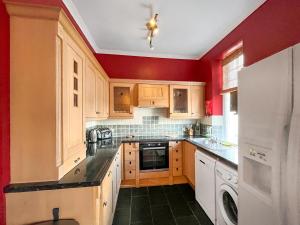 Kuchyň nebo kuchyňský kout v ubytování Caberfeidh Retreat - Uk48881