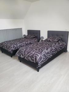 Postel nebo postele na pokoji v ubytování L envol