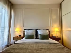 Postel nebo postele na pokoji v ubytování Magic Place III - Francuska Park - Free Garage - Self Check-in