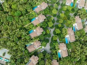 an overhead view of a yard with houses and trees at Premier Village Danang Resort Managed By Accor in Da Nang