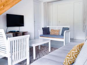 TV a/nebo společenská místnost v ubytování Villa Armony Zen, Havre de Paix